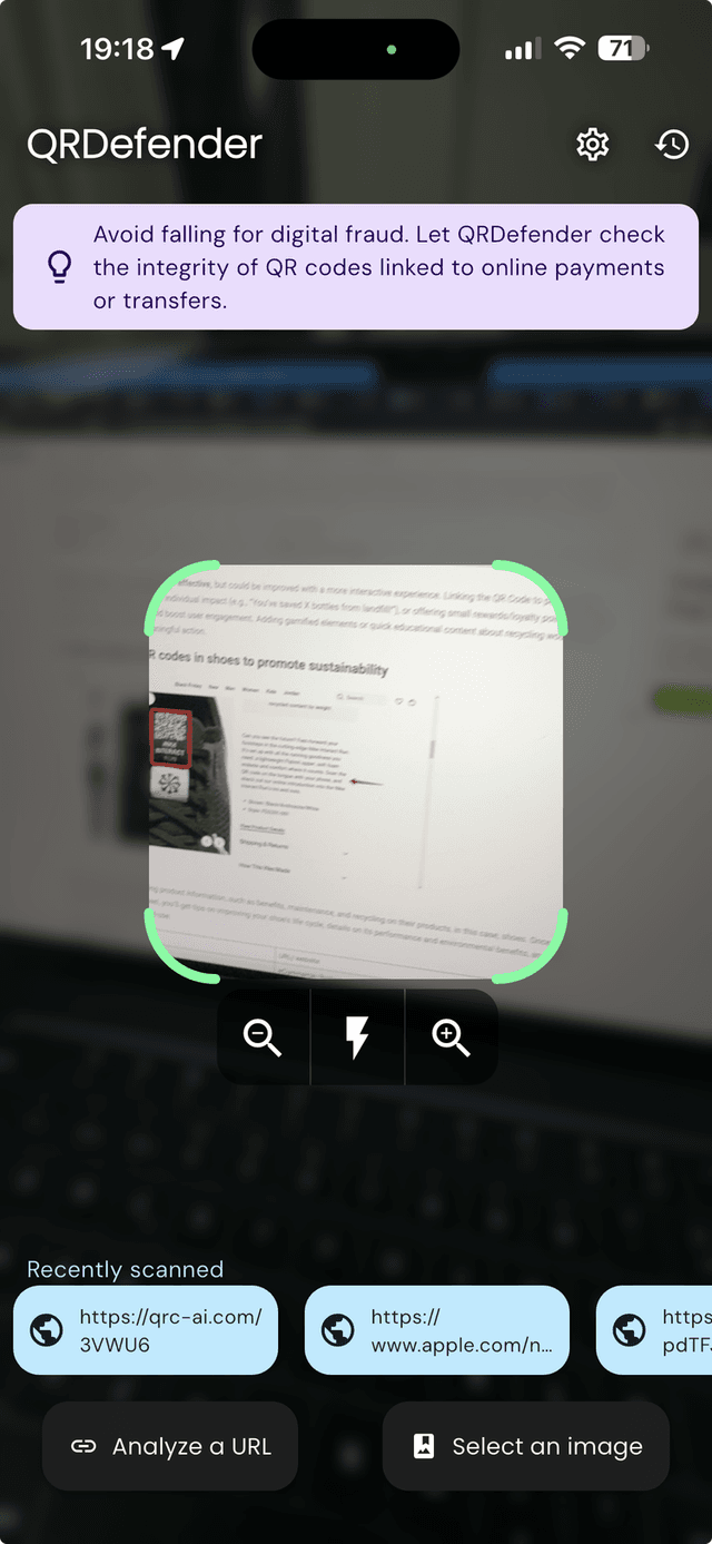 QRDefender scanner screen showing QR code scanning in action with real-time analysis